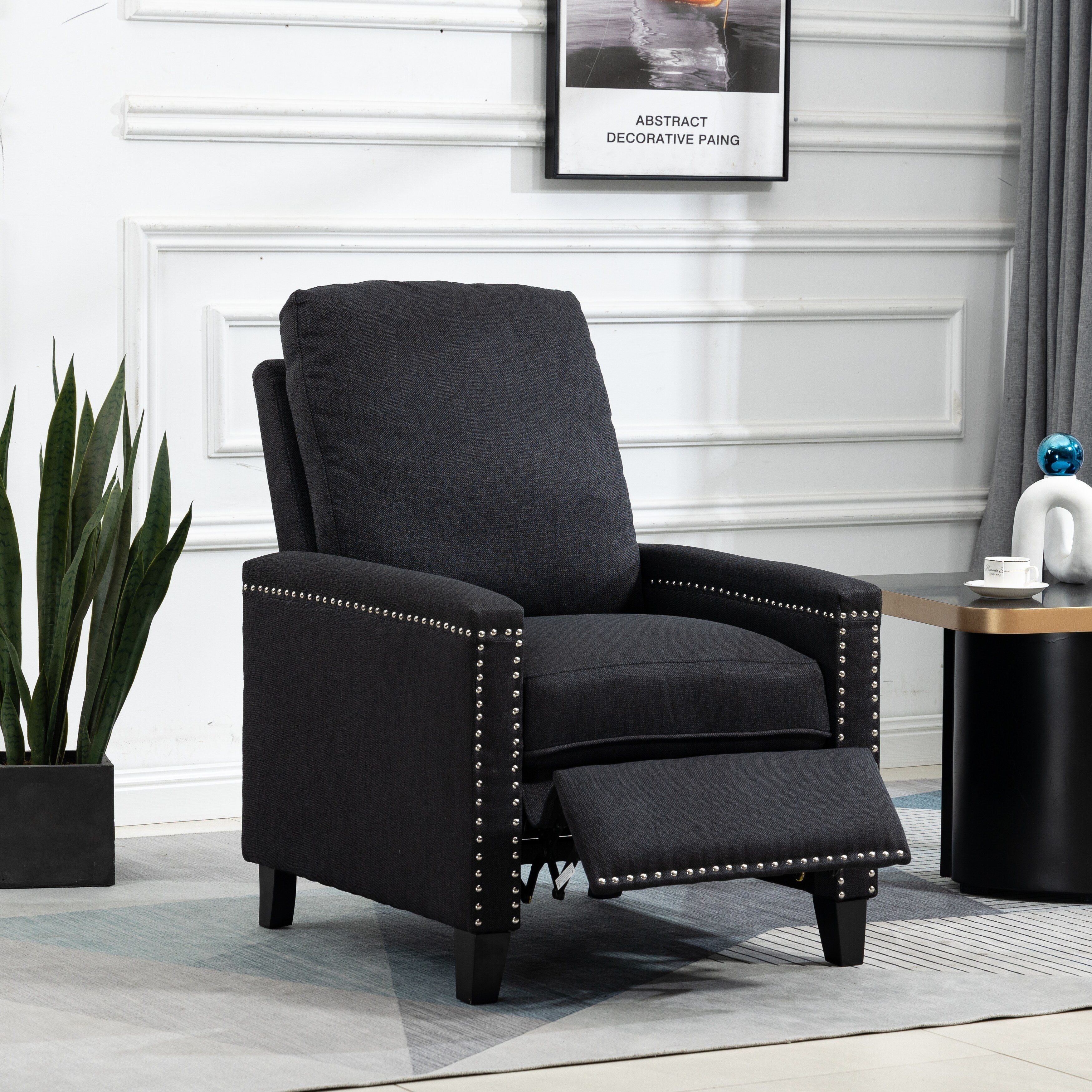 Fauteuil inclinable manuel moderne en velours avec coussins et décoration cloutée
