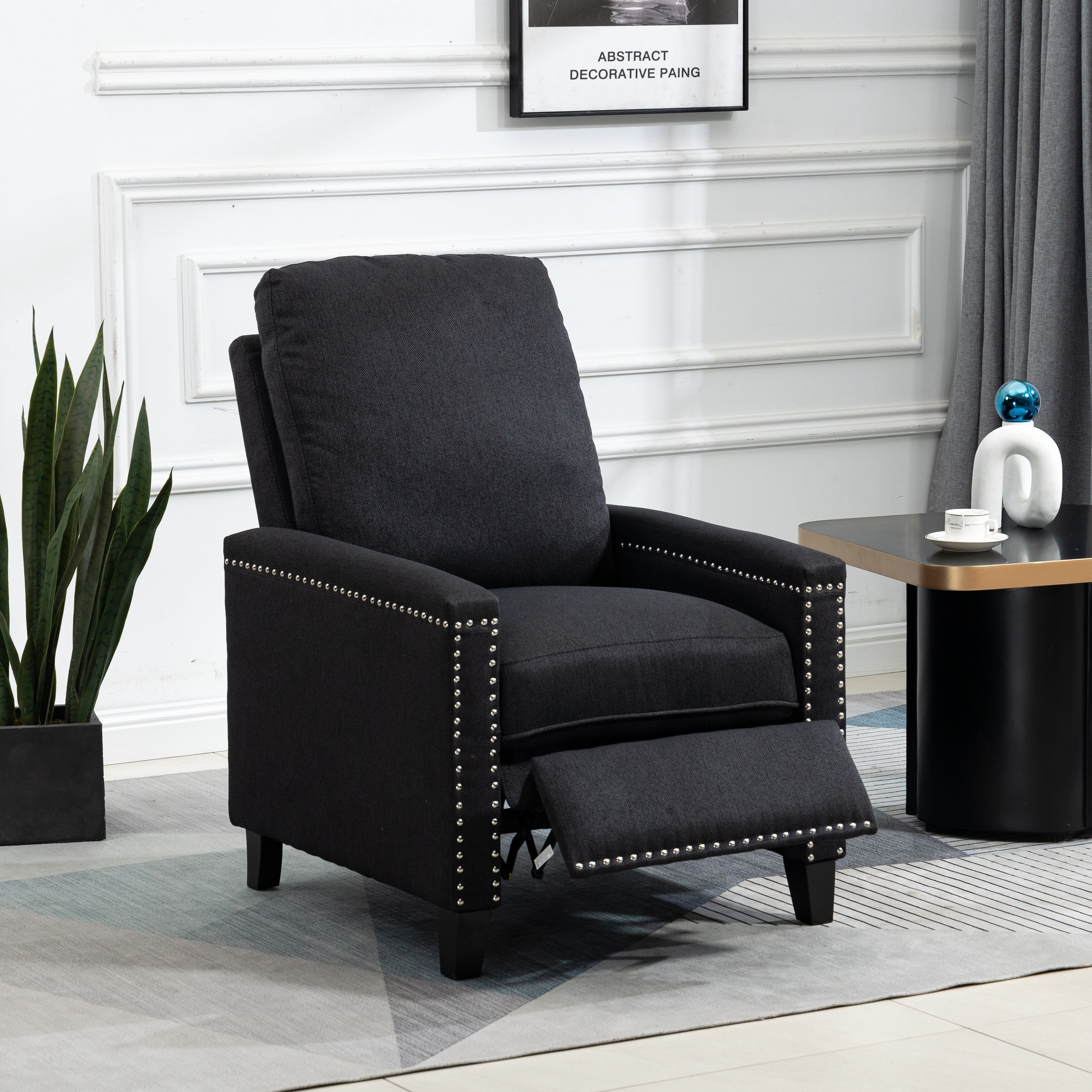Fauteuil inclinable manuel moderne en velours avec coussins et décoration cloutée