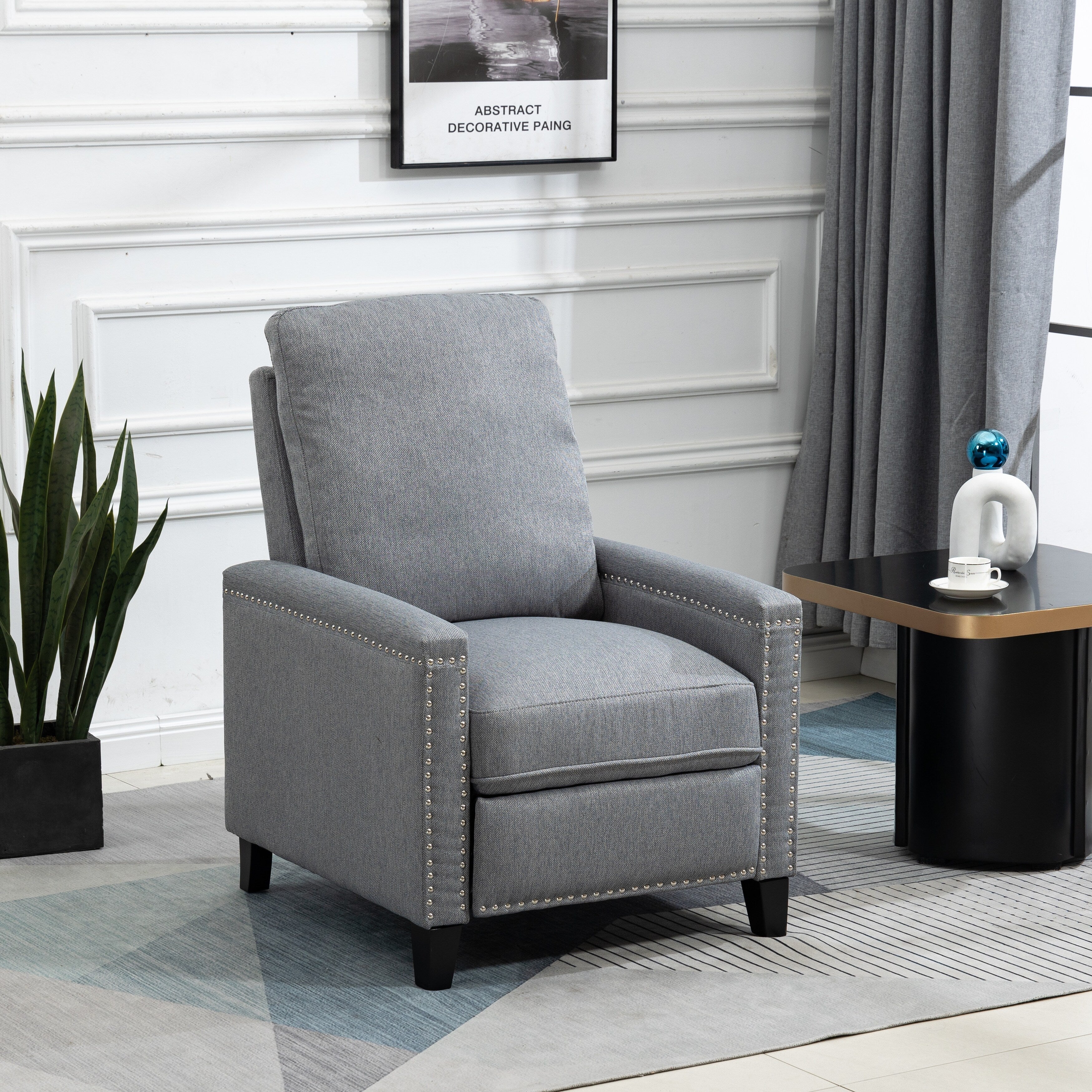 Fauteuil inclinable manuel moderne en velours avec coussins et décoration cloutée