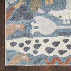 Tapis Nourison Astra lavable en machine à imprimé animal