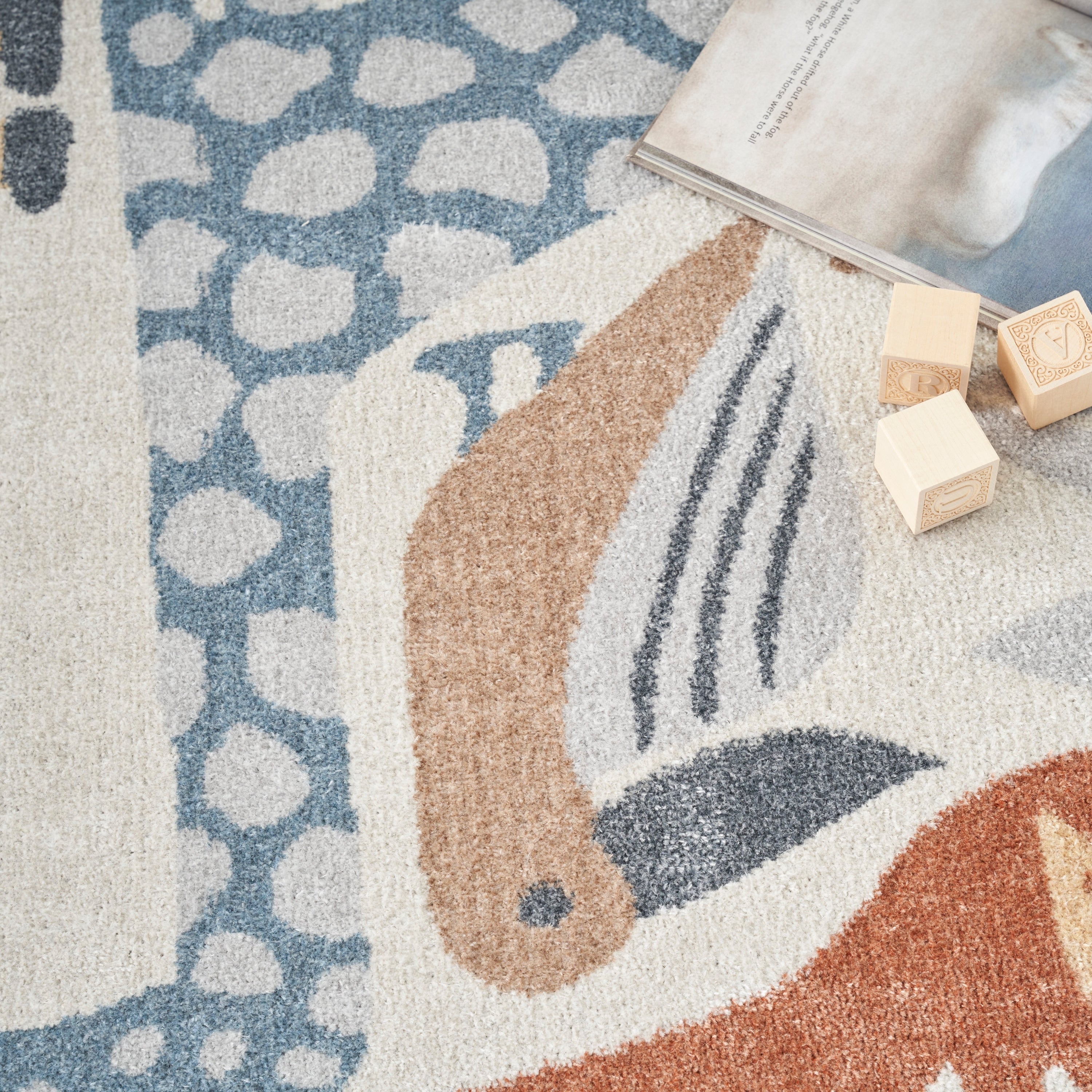 Tapis Nourison Astra lavable en machine à imprimé animal