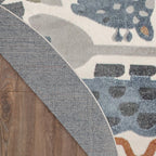 Tapis Nourison Astra lavable en machine à imprimé animal