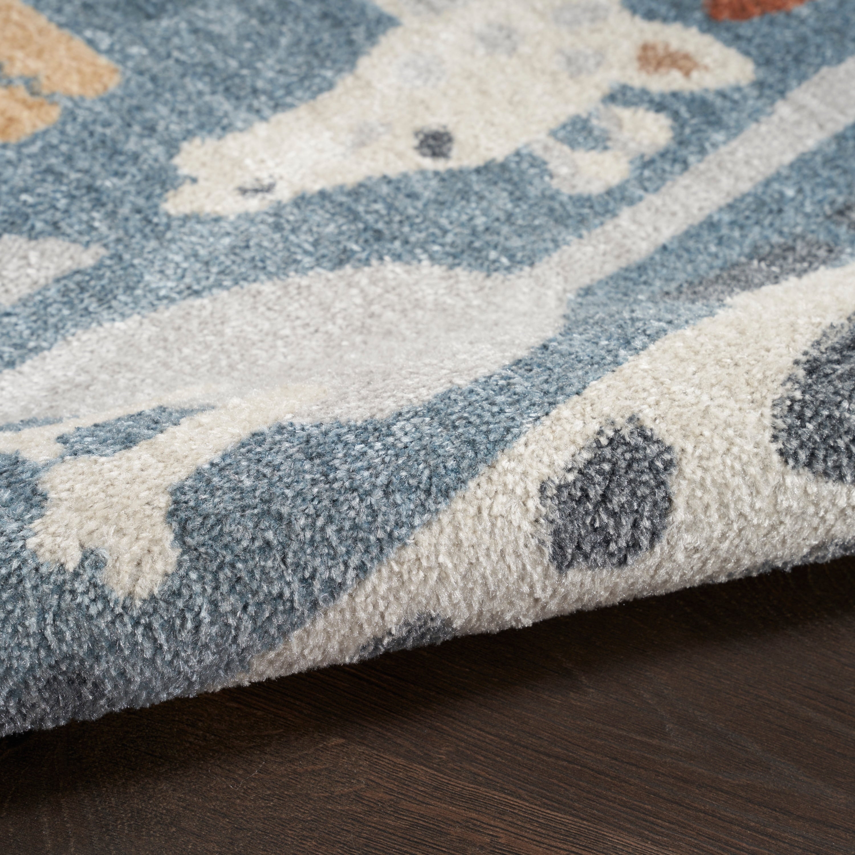 Tapis Nourison Astra lavable en machine à imprimé animal
