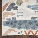 Tapis Nourison Astra lavable en machine à imprimé animal