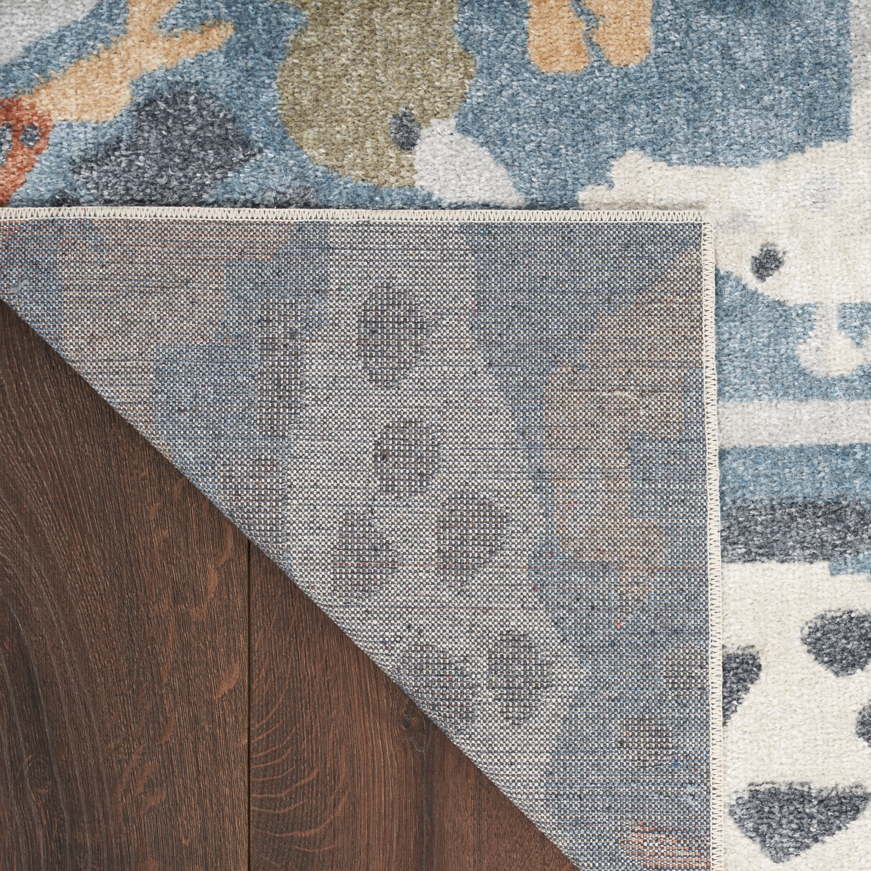 Tapis Nourison Astra lavable en machine à imprimé animal