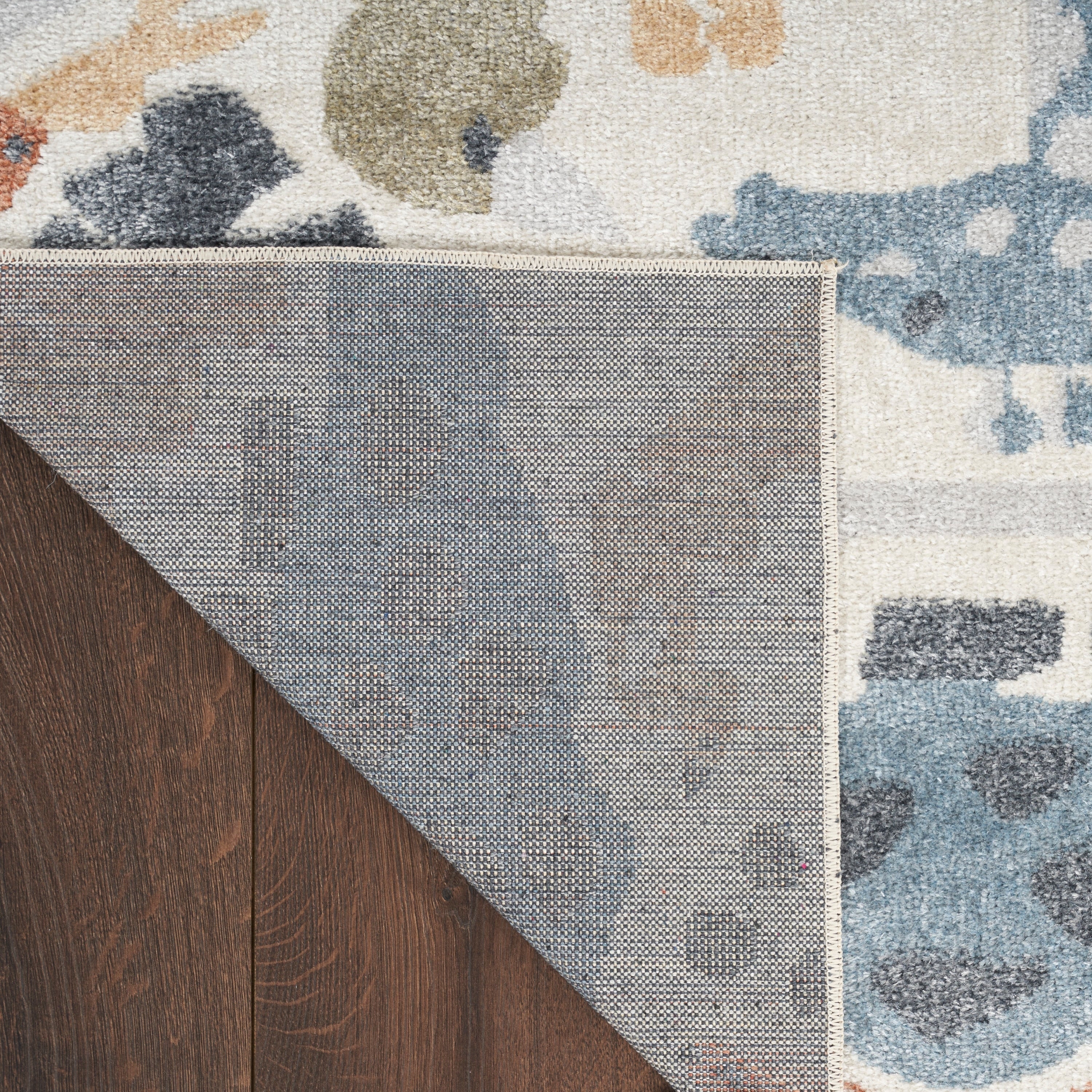 Tapis Nourison Astra lavable en machine à imprimé animal