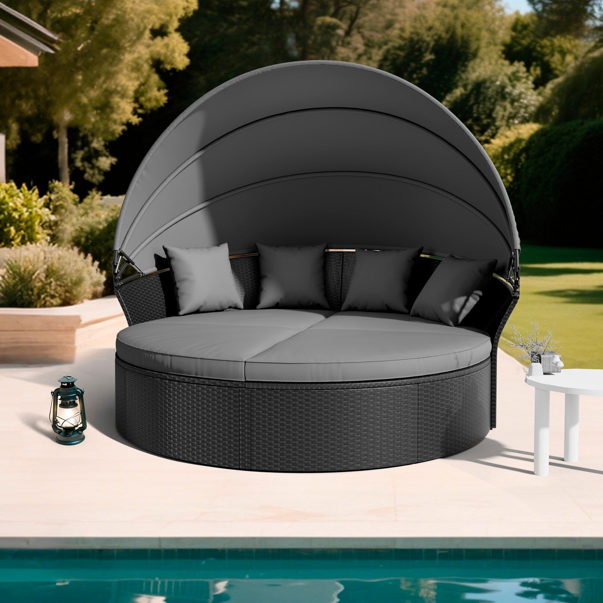 Ensemble de canapé-lit d'extérieur Nuon 4 pièces en osier noir avec auvent rétractable par Havenside Home