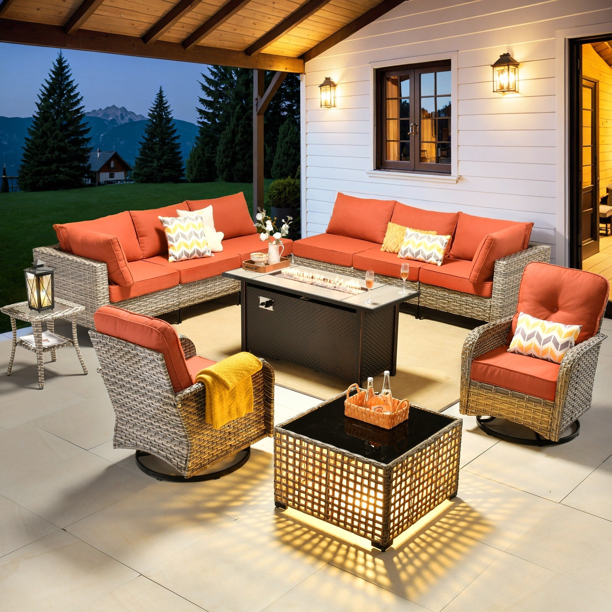 Ensemble de 11 chaises pivotantes d'extérieur en osier OVIOS avec table à feu
