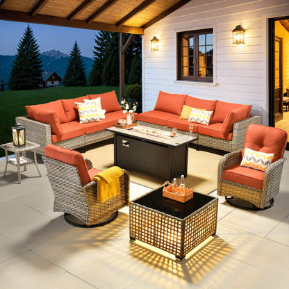 Ensemble de 11 chaises pivotantes d'extérieur en osier OVIOS avec table à feu