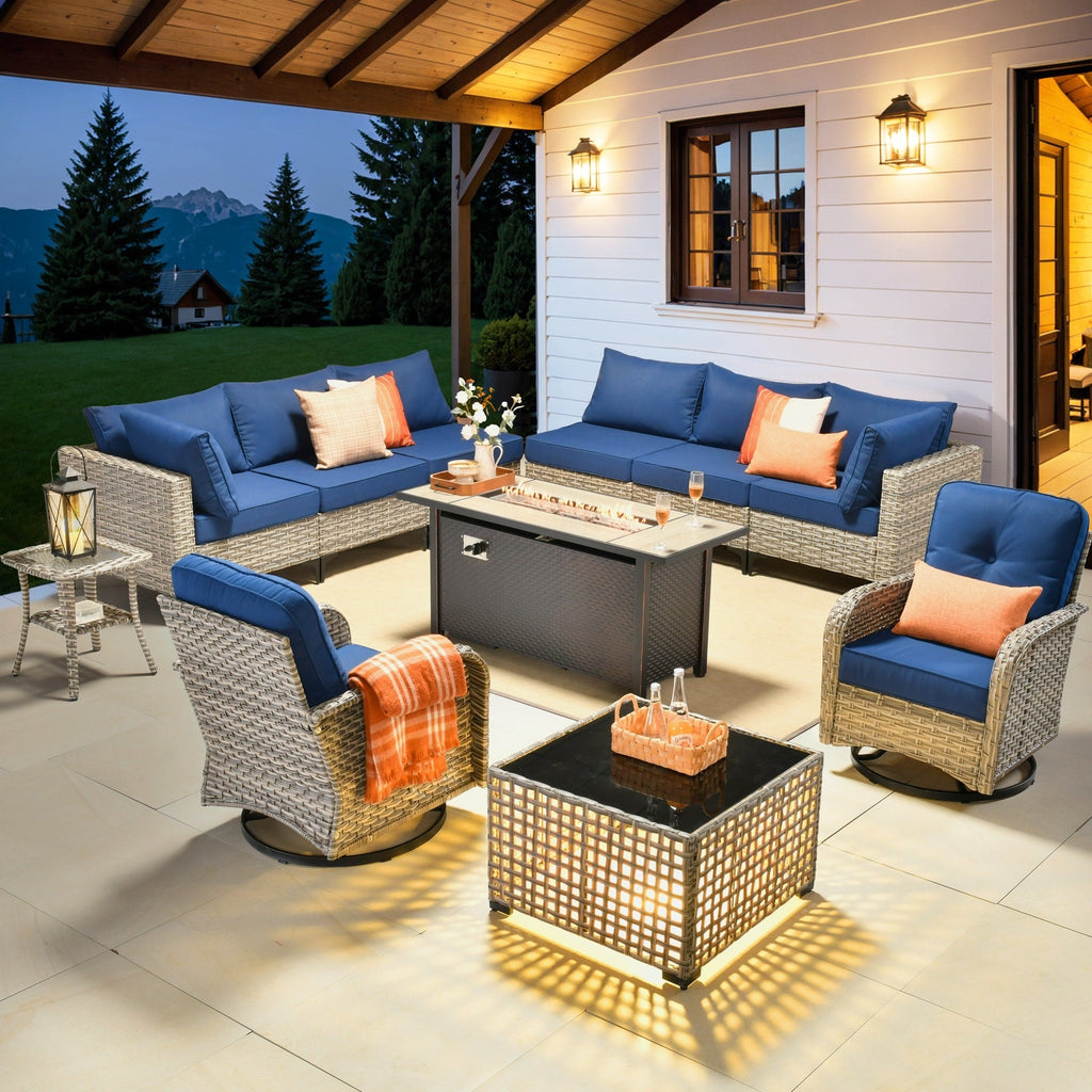 Ensemble de 11 chaises pivotantes d'extérieur en osier OVIOS avec table à feu