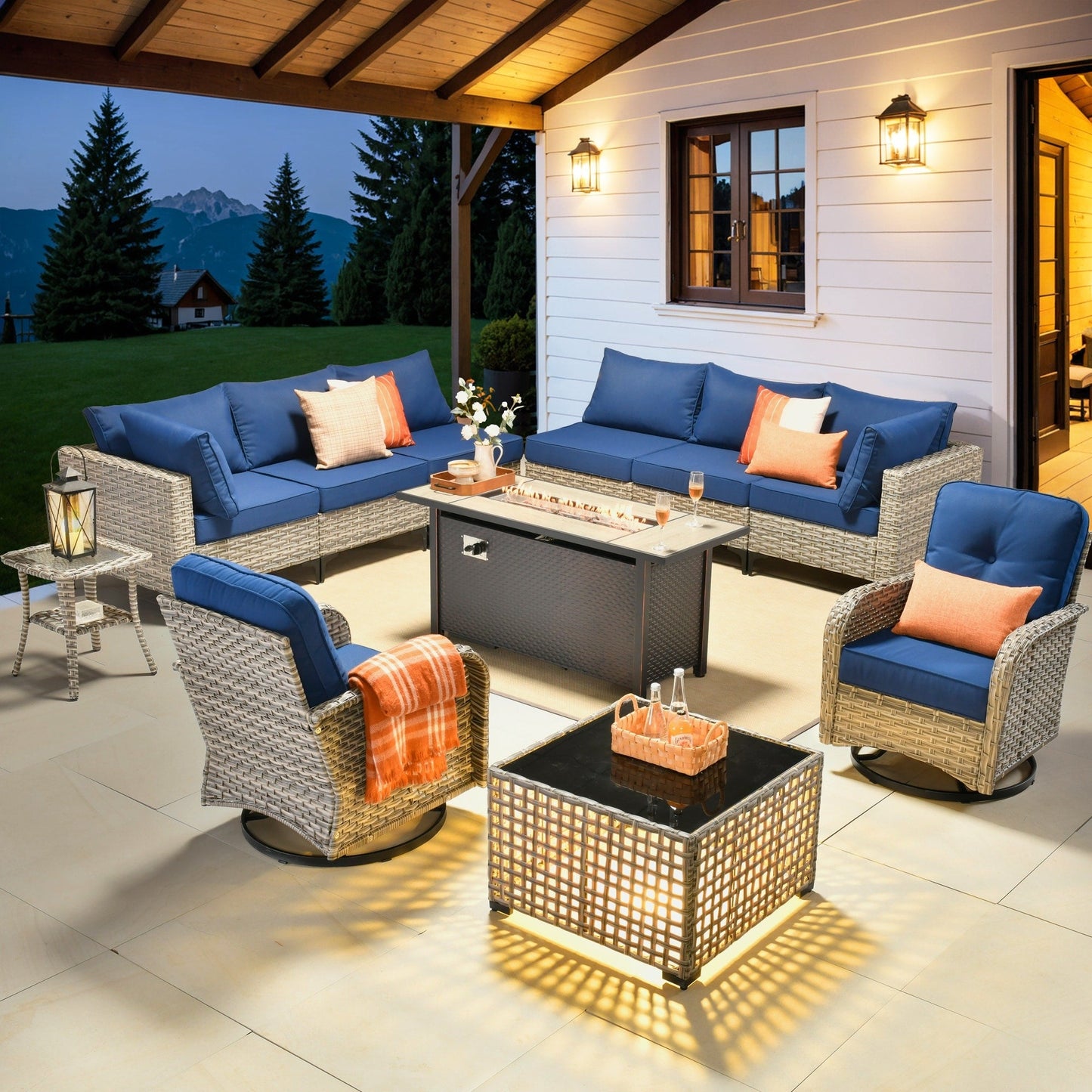 Ensemble de 11 chaises pivotantes d'extérieur en osier OVIOS avec table à feu