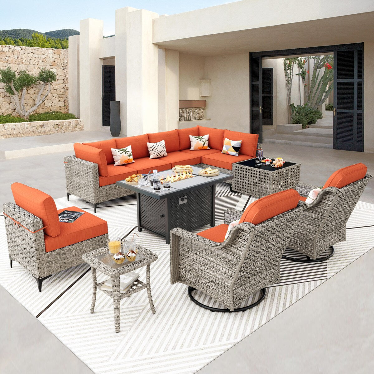 Ensemble de 11 chaises pivotantes d'extérieur en osier OVIOS avec table basse et foyer à énergie solaire