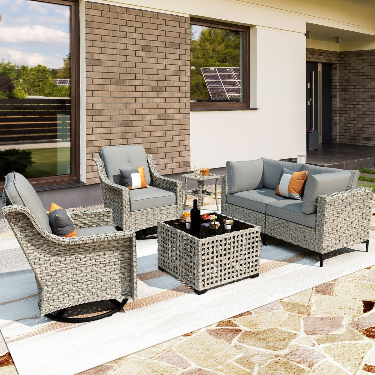 Ensemble de 6 chaises pivotantes d'extérieur en osier OVIOS avec table basse à énergie solaire