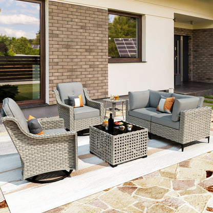Ensemble de 6 chaises pivotantes d'extérieur en osier OVIOS avec table basse à énergie solaire