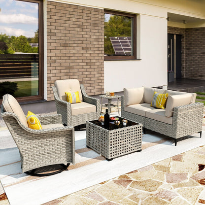 Ensemble de 6 chaises pivotantes d'extérieur en osier OVIOS avec table basse à énergie solaire