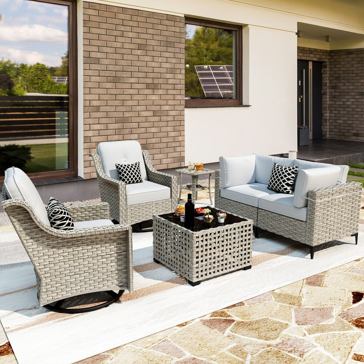 Ensemble de 6 chaises pivotantes d'extérieur en osier OVIOS avec table basse à énergie solaire