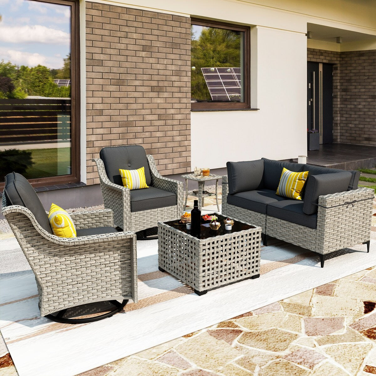 Ensemble de 6 chaises pivotantes d'extérieur en osier OVIOS avec table basse à énergie solaire