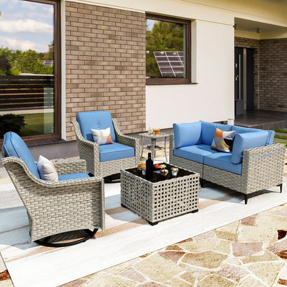 Ensemble de 6 chaises pivotantes d'extérieur en osier OVIOS avec table basse à énergie solaire