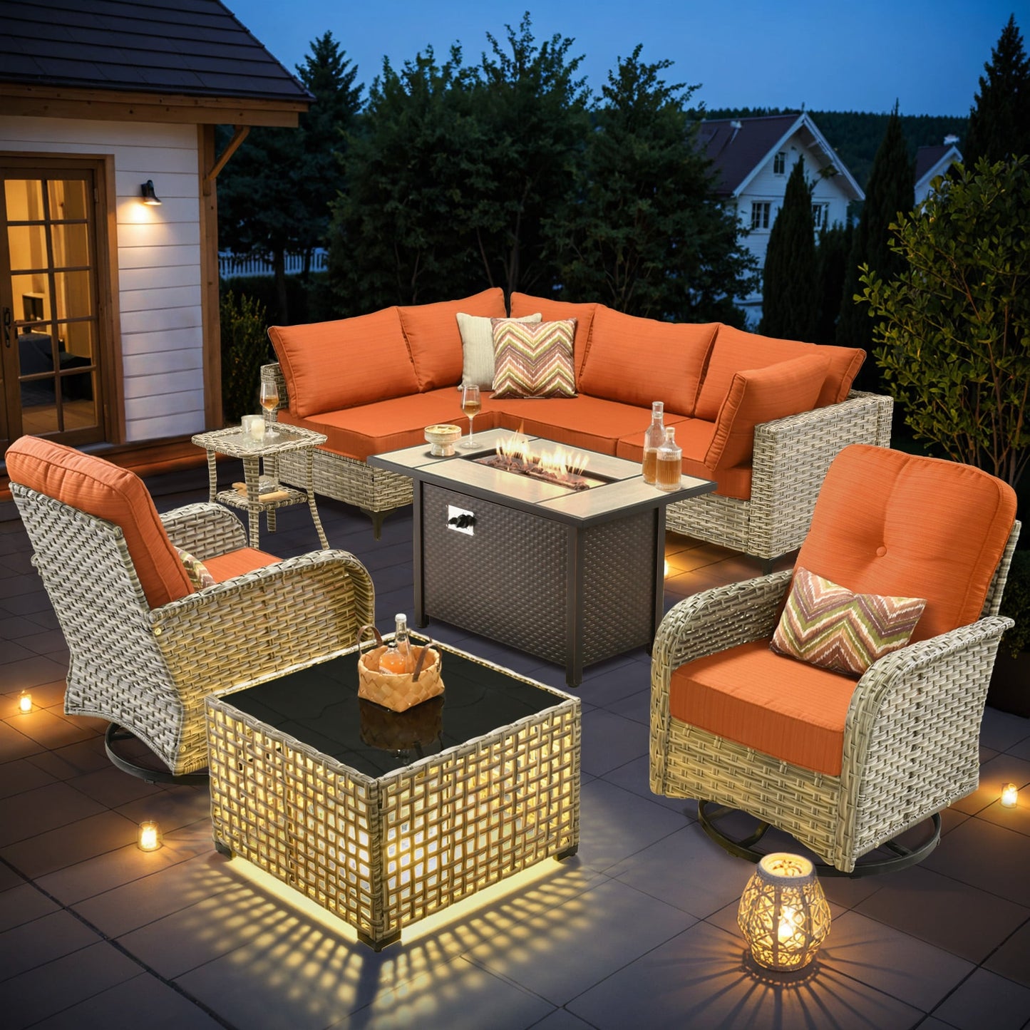 Ensemble de 9 chaises pivotantes d'extérieur en osier OVIOS avec table à feu