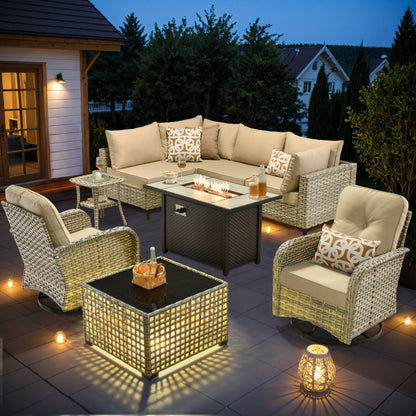 Ensemble de 9 chaises pivotantes d'extérieur en osier OVIOS avec table à feu