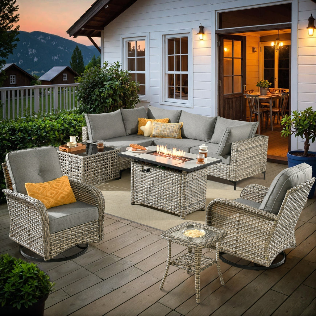 Ensemble de 9 chaises pivotantes d'extérieur en osier OVIOS avec table à feu