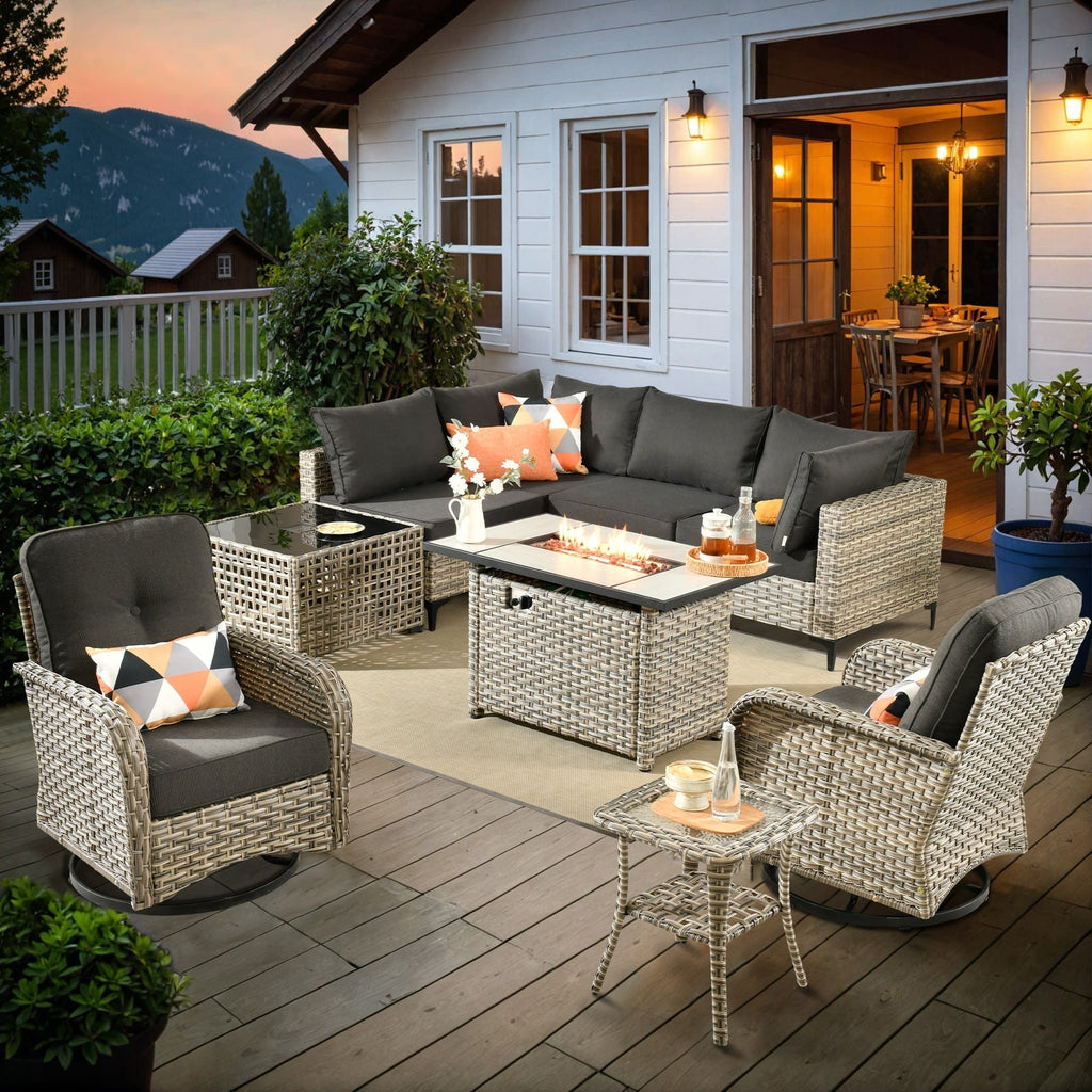 Ensemble de 9 chaises pivotantes d'extérieur en osier OVIOS avec table à feu