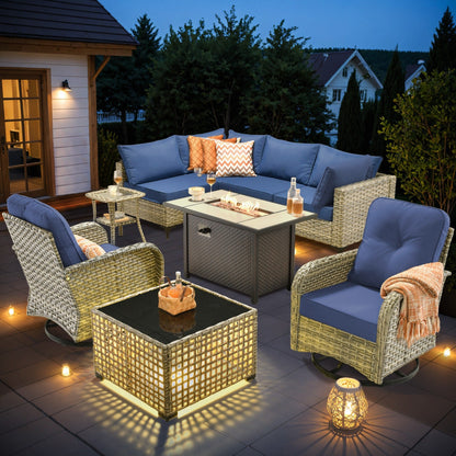 Ensemble de 9 chaises pivotantes d'extérieur en osier OVIOS avec table à feu