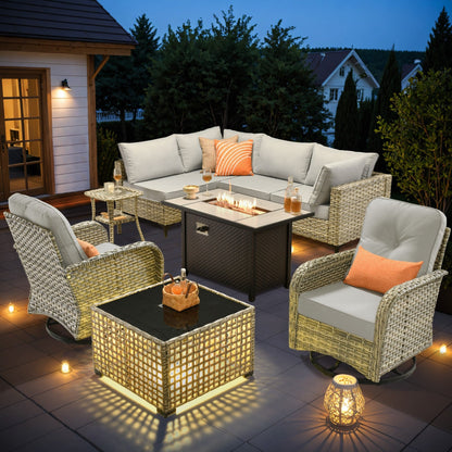 Ensemble de 9 chaises pivotantes d'extérieur en osier OVIOS avec table à feu