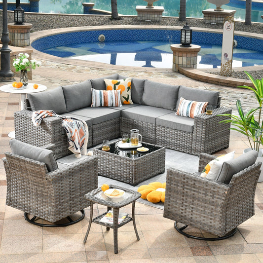 Ensemble de 9 chaises pivotantes à bascule en osier pour patio OVIOS avec tables à plateau en verre