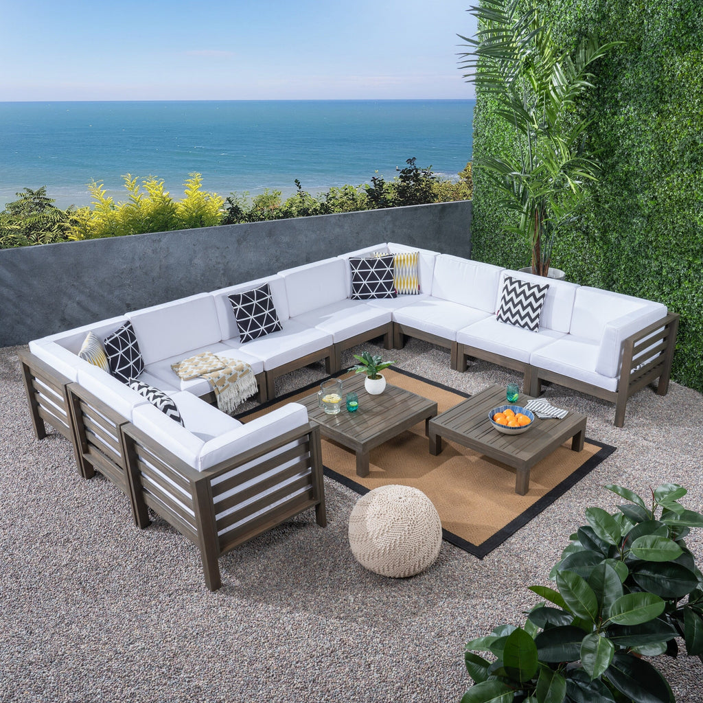 Ensemble de canapés d'extérieur Oana 12 pièces en bois d'acacia en forme de U par Christopher Knight Home