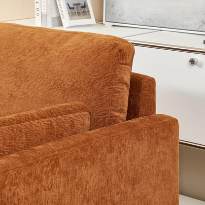 Canapé causeuse en chenille orange avec coussins de dossier et oreillers