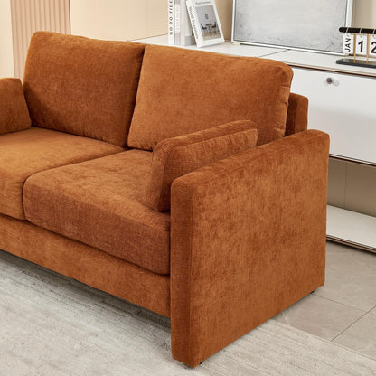 Canapé causeuse en chenille orange avec coussins de dossier et oreillers