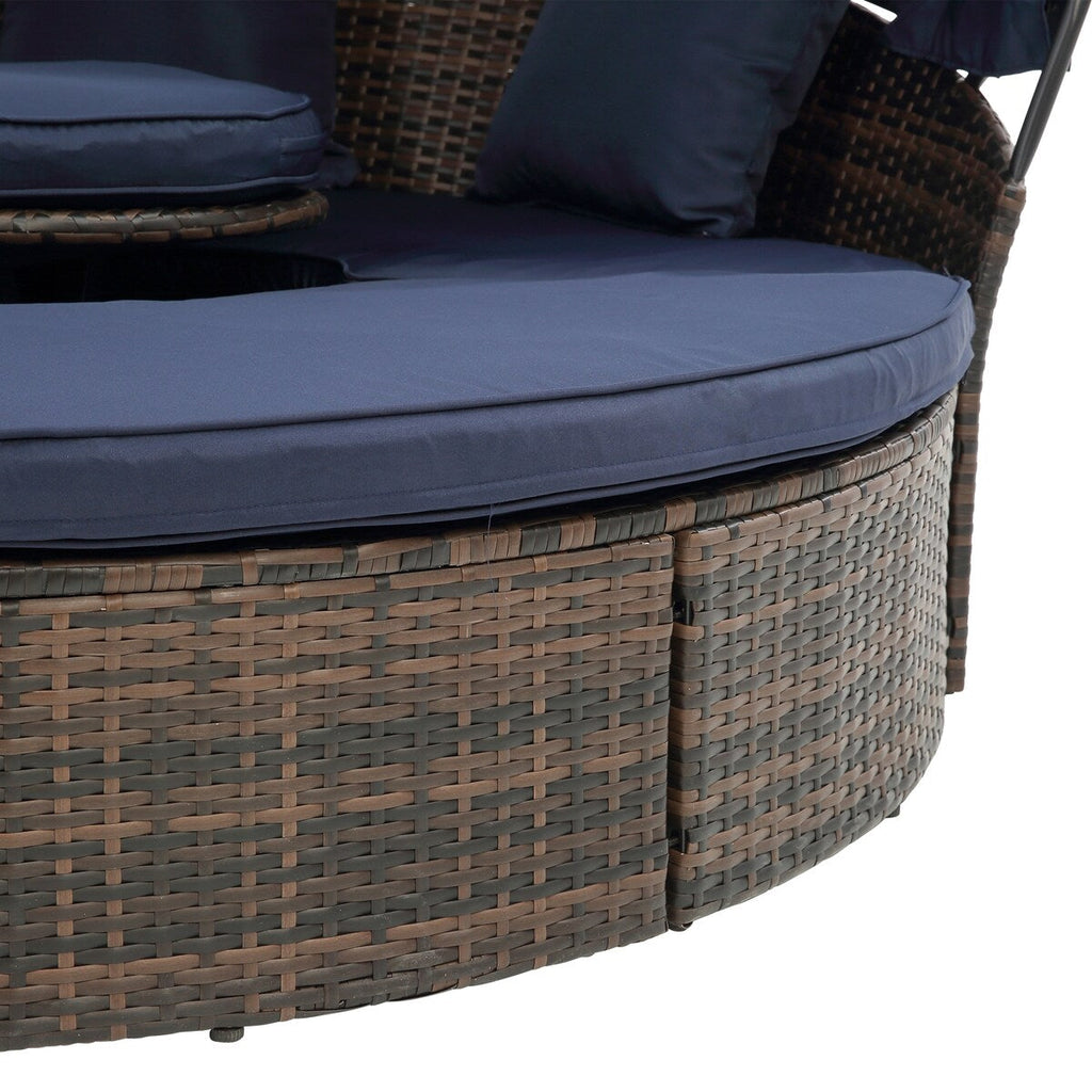 Lit de repos rond en rotin pour extérieur avec table basse relevable, canapé-lit profond bleu marine avec oreillers et coussins lavables