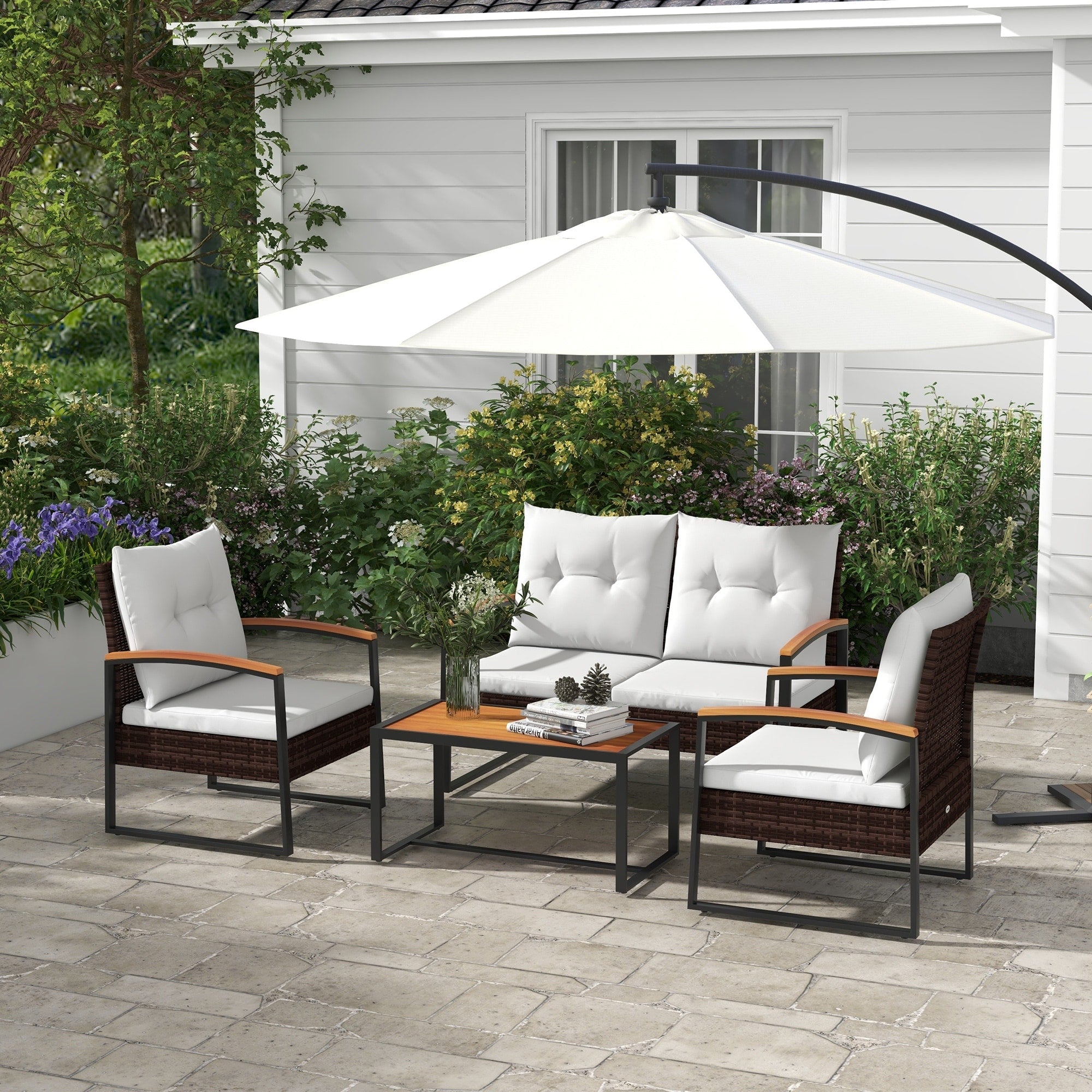 Ensemble de meubles de jardin Outsunny 4 pièces avec canapé en rotin, table en bois, coussins et salon de jardin pour jardin et pelouse