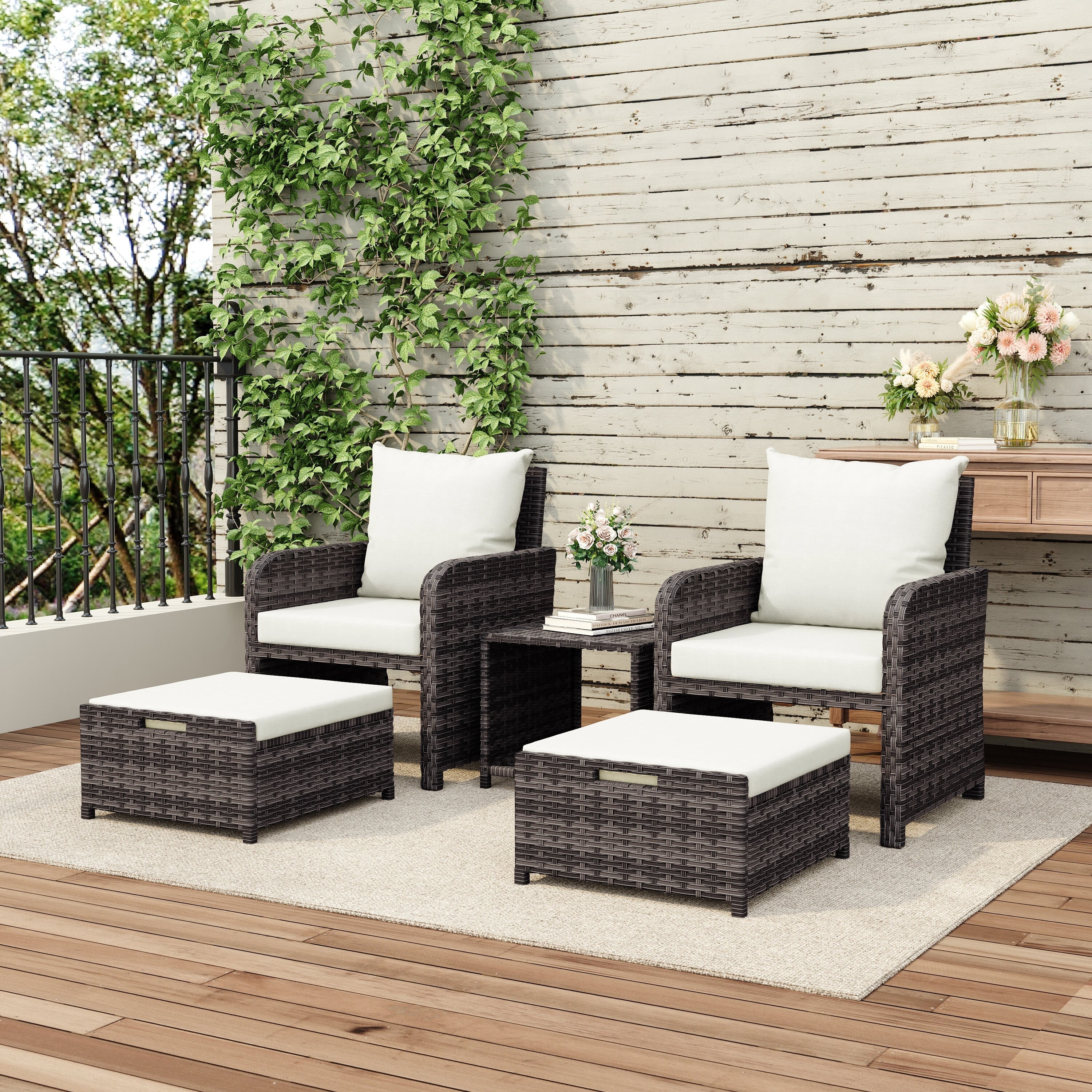 Ensemble de salon de jardin 5 pièces en rotin avec coussins et table basse ottomane