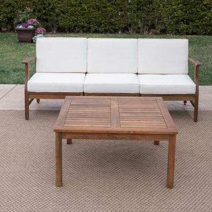Ensemble canapé et table d'extérieur Perla en acacia, 4 pièces, rembourré, par Christopher Knight Home