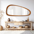 Miroir mural asymétrique en forme de pavé avec cadre en pin