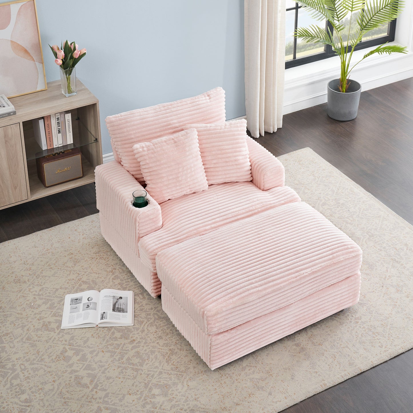 Fauteuil-canapé en velours côtelé rose avec pouf et porte-gobelet