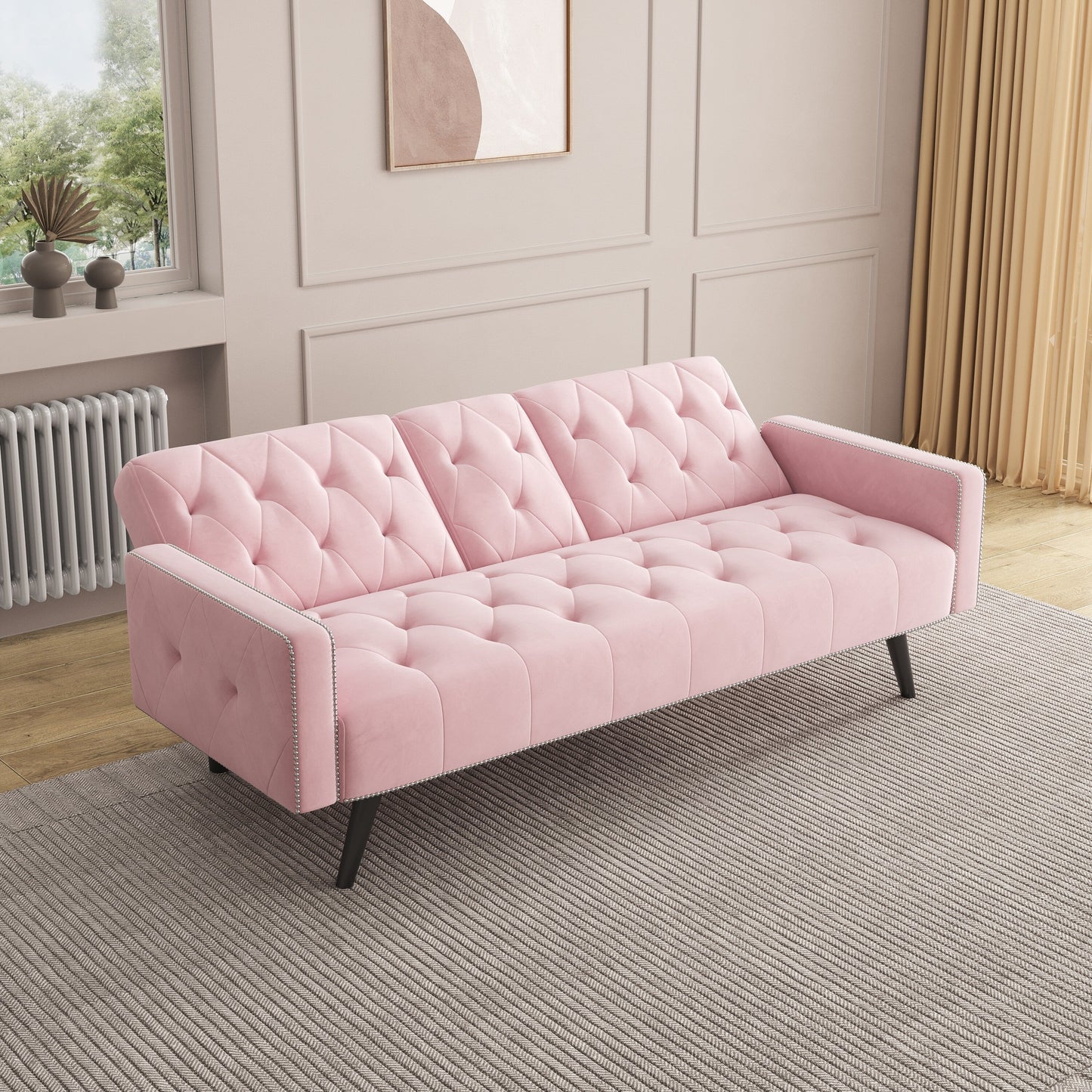 Canapé-lit 3 places en velours rose avec tête de clou et porte-gobelets