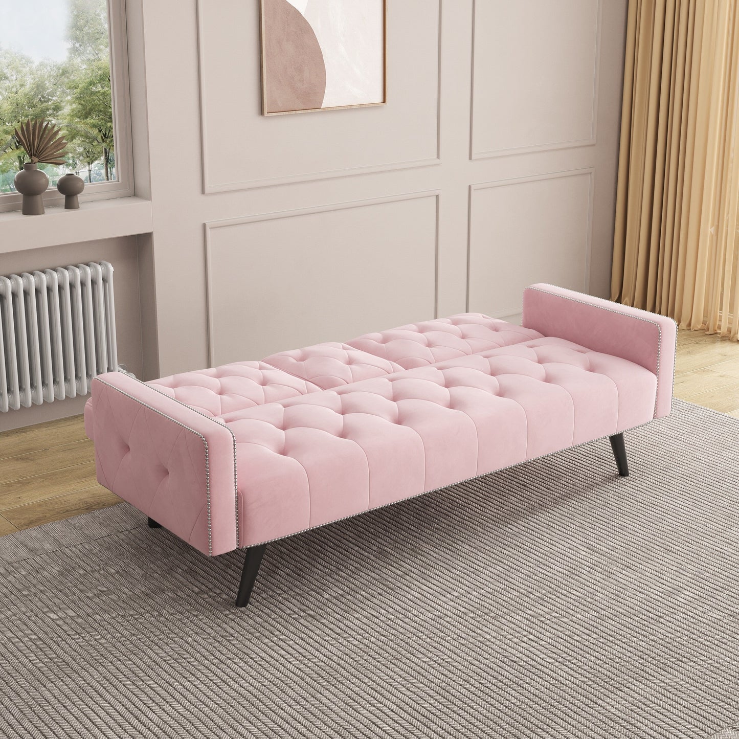 Canapé-lit 3 places en velours rose avec tête de clou et porte-gobelets