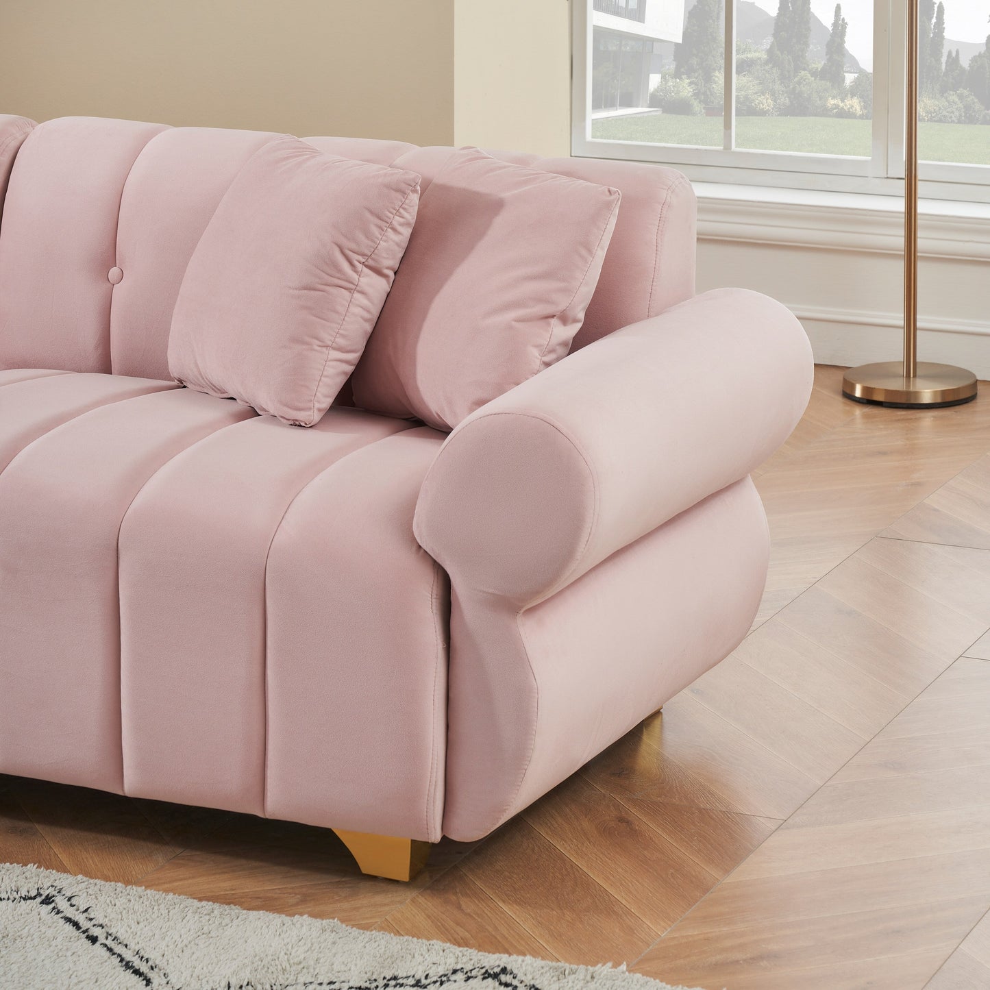 Canapé 3 places en velours rose avec coussins à ressorts