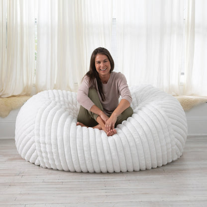 Pouf causeuse en fausse fourrure côtelée et pelucheuse - 64 - Crème