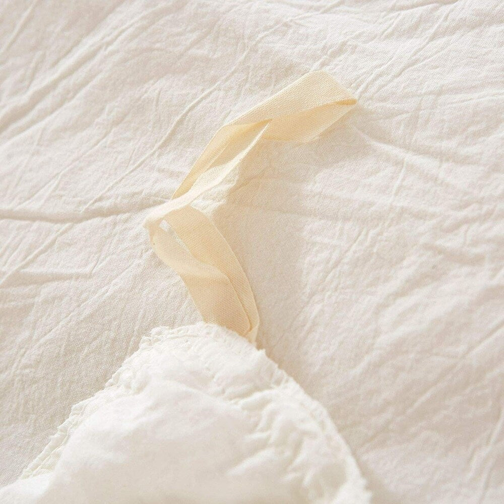 Parure de lit réversible en coton à pompons