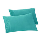 Taies d'oreiller Porch &amp; Den Briggs résistantes aux plis et à la décoloration (lot de 2)