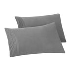 Taies d'oreiller Porch &amp; Den Briggs résistantes aux plis et à la décoloration (lot de 2)