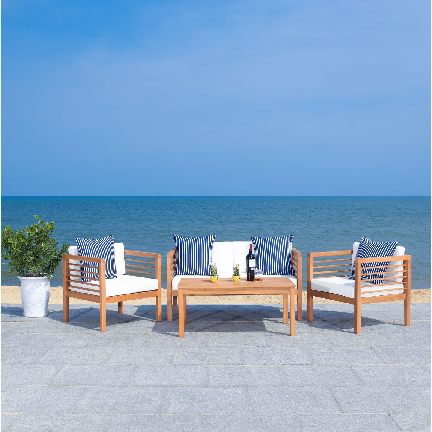 Ensemble de salon de jardin Alda 4 pièces SAFAVIEH avec coussins décoratifs – 51 L x 26 P x 26 H