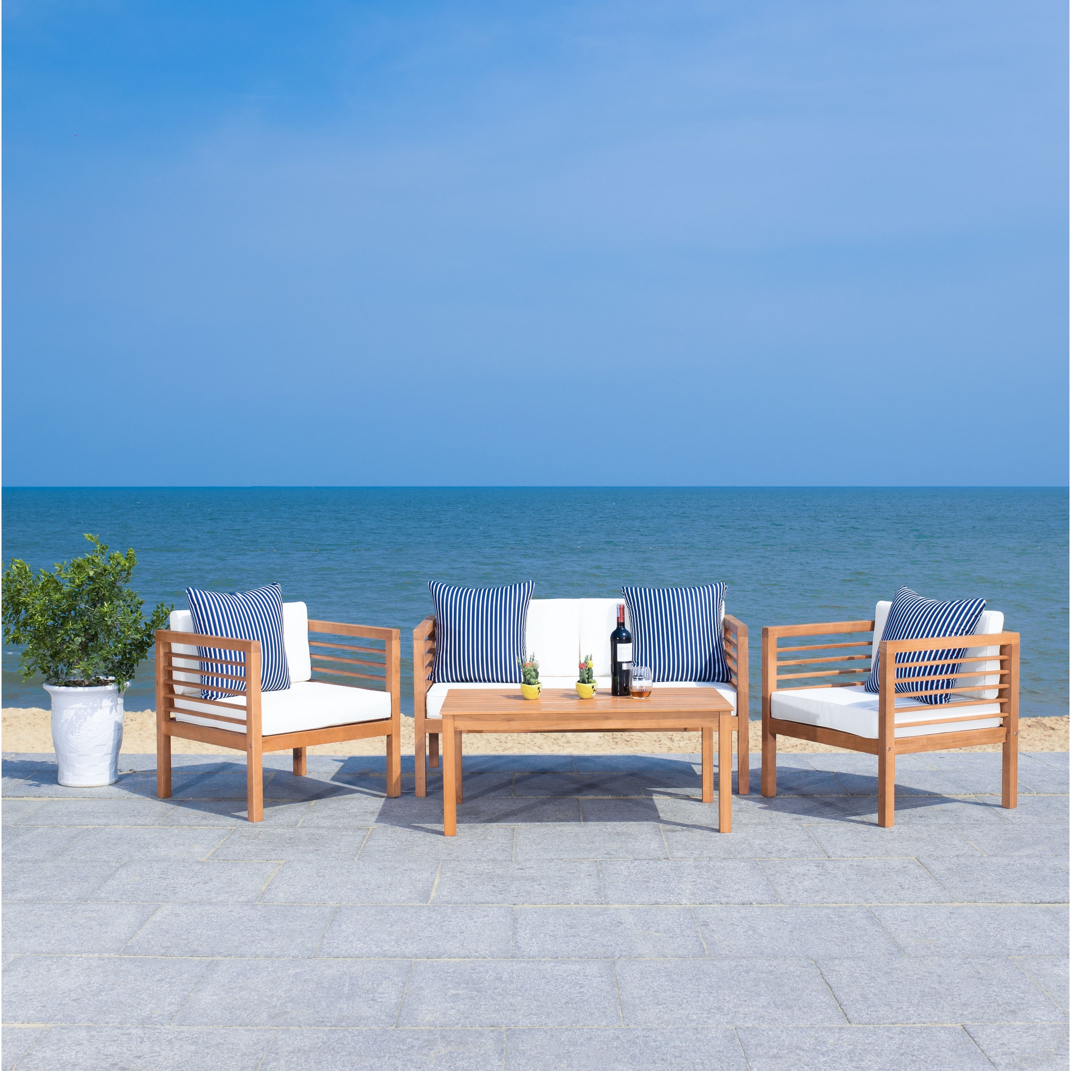 Ensemble de salon de jardin Alda 4 pièces SAFAVIEH avec coussins décoratifs – 51 L x 26 P x 26 H
