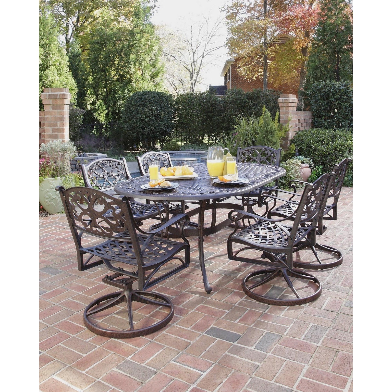 Ensemble de salle à manger d'extérieur Sanibel en fonte d'aluminium, 7 pièces, avec table ovale et 6 chaises pivotantes, par Homestyles