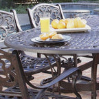 Ensemble de salle à manger d'extérieur Sanibel en fonte d'aluminium, 7 pièces, avec table ovale et 6 chaises pivotantes, par Homestyles