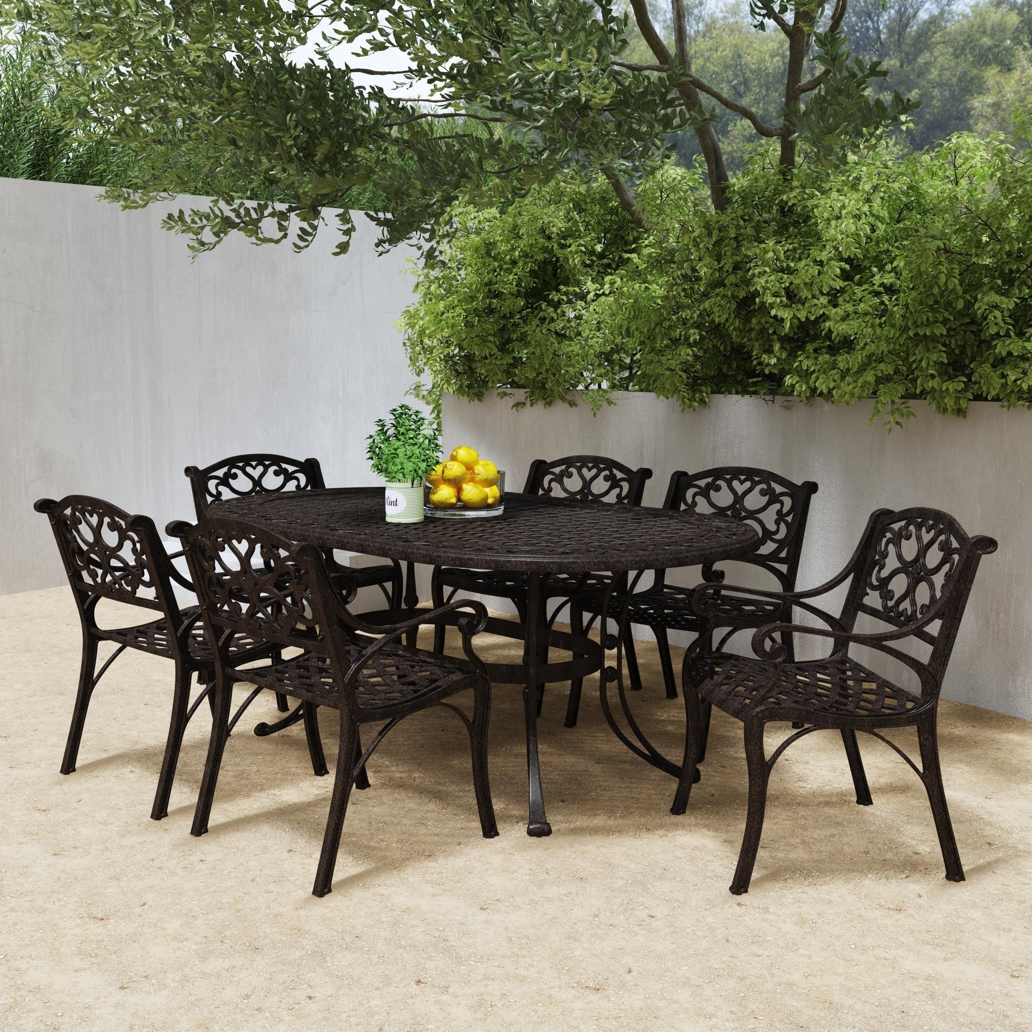Ensemble de salle à manger d'extérieur en aluminium bronze Sanibel 7 pièces avec table à manger ovale de 72 pouces et six fauteuils par Homestyles